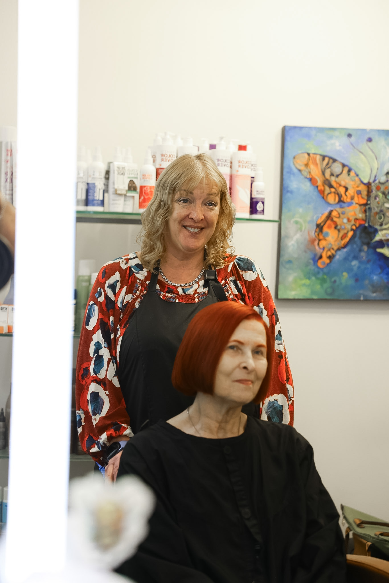 A stylist and client at The Look Salon Suites